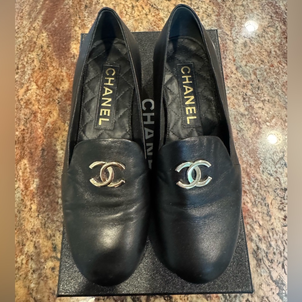 CHANEL Black Leather Loafers with Silver Logo